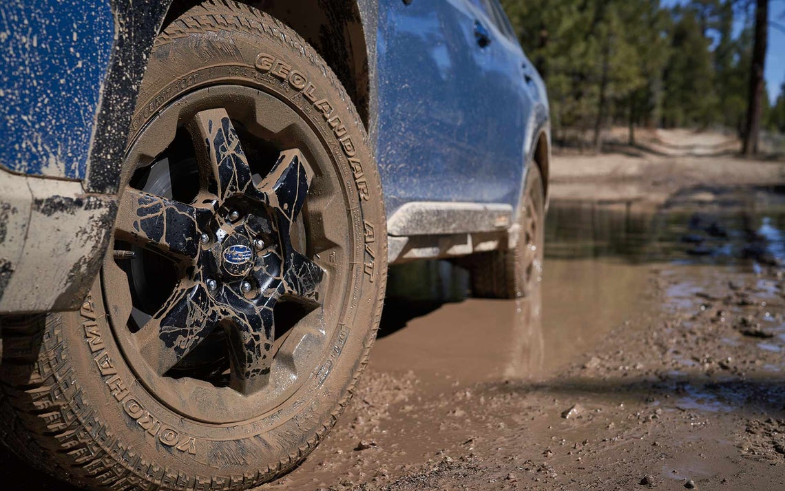 Close up of muddy wheel on Forester Wilderness